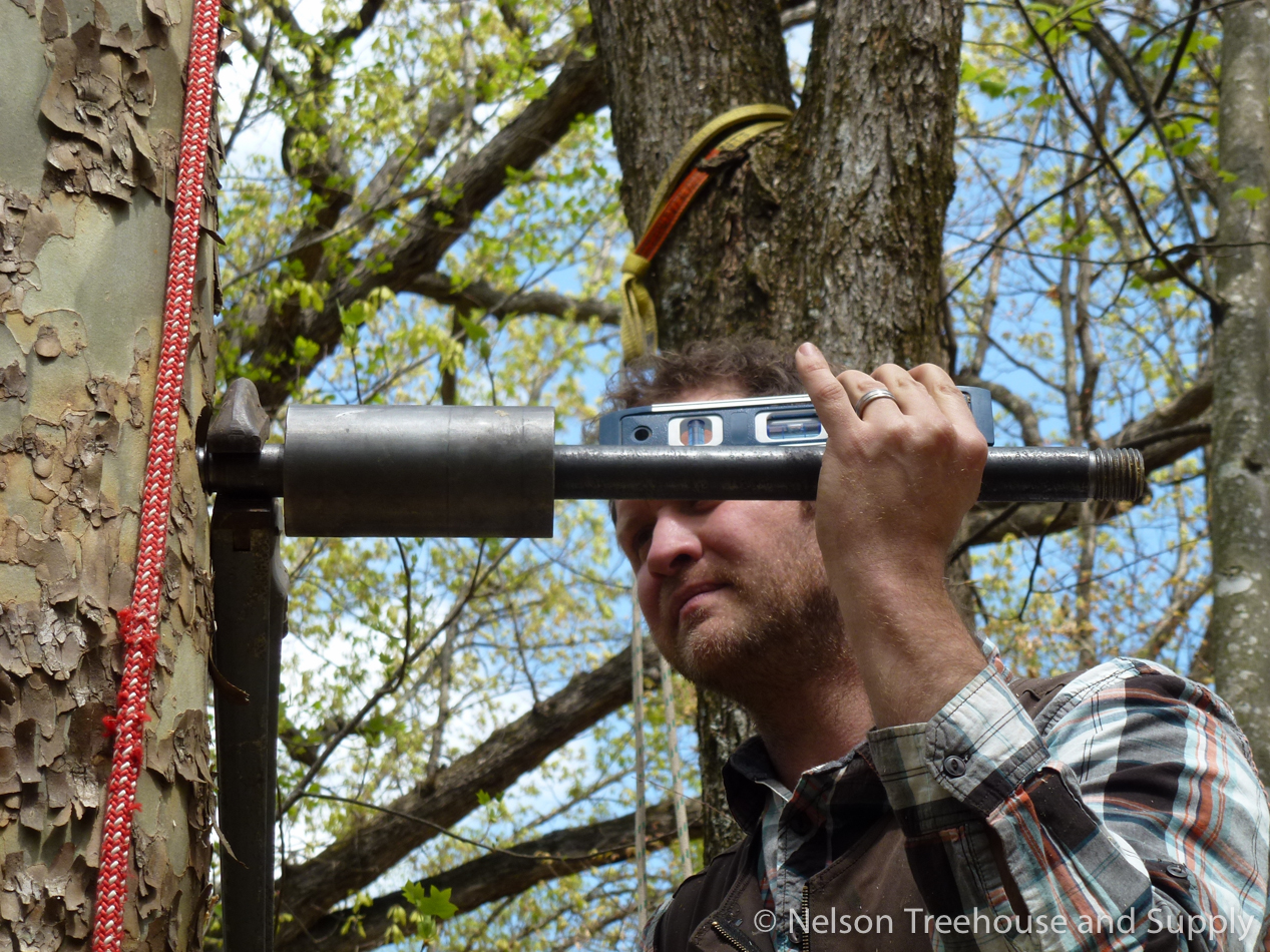  Daryl installs a tab at a treehouse workshop 